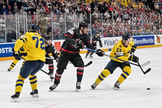 PRAGUE, CZECH REPUBLIC - MAY 26: Pierre-Luc Dubois of Canada fights for the puck possession with Lucas Raymond of Sweden (R) during 2024 IIHF Ice hockey, Eishockey World Championship, WM, Weltmeisterschaft Czechia Third Place Match between Sweden and Canada at Prague Arena on May 26, 2024 in Prague, Czech Republic. Prague Prague Arena Czech Republic Copyright: xJustPictures.ch AndreaxBrancax jp-en-EuSpIm-AB_26052024_AAB_6789
