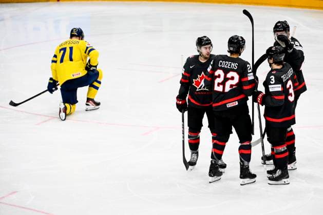 Canadian players, L-R Andrew Mangiapane, Dylan Cozens, Olen Zellweger and Jamie Oleksiak, celebrate a goal (1:1) during the 2024 IIHF World Championship, WM, Weltmeisterschaft match for the third place, Sweden vs Canada, in Prague, Czech Republic, on May 26, 2024. On the left side is seen Victor Olofsson (SWE). (CTKxPhoto OndrejxDeml) CTKPhotoP2024052604083 CTKPhotoP2024052604083