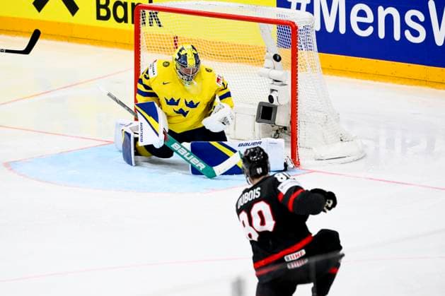 Goalkeeper Filip Gustavsson (SWE), left, gets a goal, Pierre-Luc Dubois (CAN), right, in action during the 2024 IIHF World Championship, WM, Weltmeisterschaft match for the third place, Sweden vs Canada, in Prague, Czech Republic, on May 26, 2024. (CTKxPhoto OndrejxDeml) CTKPhotoP2024052604444 CTKPhotoP2024052604444