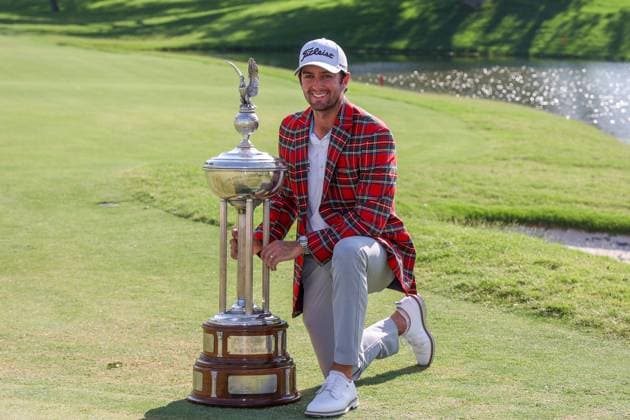 FORT WORTH, TX - MAY 26: Davis Riley (USA) poses with the trophy after winning the Charles Schwab Challenge on May 26, 2024 at Colonial Country Club in Fort Worth, TX. (Photo by George Walker Icon Sportswire) GOLF: MAY 26 PGA, Golf Herren Charles Schwab Challenge EDITORIAL USE ONLY Icon240526093