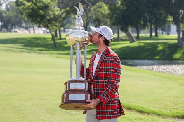 FORT WORTH, TX - MAY 26: Davis Riley (USA) poses with the trophy after winning the Charles Schwab Challenge on May 26, 2024 at Colonial Country Club in Fort Worth, TX. (Photo by George Walker Icon Sportswire) GOLF: MAY 26 PGA, Golf Herren Charles Schwab Challenge EDITORIAL USE ONLY Icon240526096