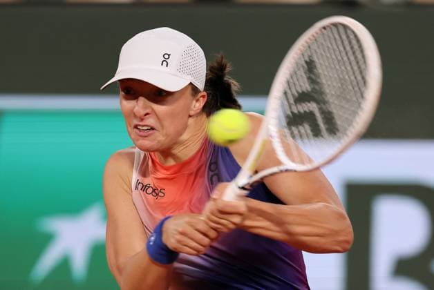 Top-seeded Iga Swiatek of Poland plays against Leolia Jeanjean of France during their first round match of the French Tennis Open at Roland Garros in Paris, France, on Monday, May 27, 2024. Swiatek won 6-1, 6-2.  PAR20240527149 MAYAxVIDON-WHITE