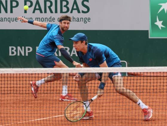 Belgian Sander Gille and Belgian Joran Vliegen pictured in action during a tennis match against Venezuelan Czech pair Martinez - Nouza, in the first round of the men s doubles, at the Roland Garros French Open tennis tournament, in Paris, France, Friday 31 May 2024. This year s tournament takes place from 26 May to 09 June. BENOITxDOPPAGNE  x93720512x