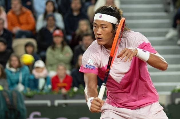 (240601) -- PARIS, June 1, 2024 -- Zhang Zhizhen of China hits a return during the men s singles third round match between Zhang Zhizhen of China and Stefanos Tsitsipas of Greece at the French Open tennis tournament at Roland Garros, Paris, France, May 31, 2024. ) (SP)FRANCE-PARIS-TENNIS-FRENCH OPEN-MEN S SINGLES MengxDingbo 
