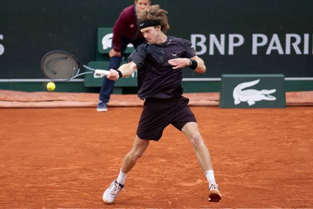 (240601) -- PARIS, June 1, 2024 -- Andrey Rublev hits a return during the men s singles third round match between Andrey Rublev of Russia and Matteo Arnaldi of Italy at the French Open tennis tournament at Roland Garros, Paris, France, May 31, 2024. ) (SP)FRANCE-PARIS-TENNIS-FRENCH OPEN-MEN S SINGLES MengxDingbo 
