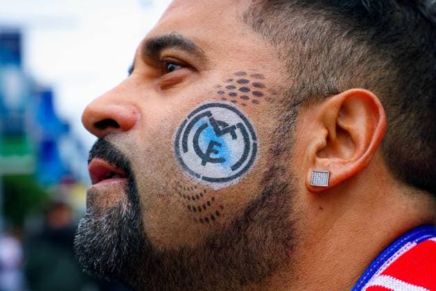 1st June 2024; Wembley Stadium, London, England; UEFA Champions League Football Final, Borussia Dortmund versus Real Madrid; Real Madrid fan with Real Madrid crest painted on his cheek  ActionPlus12649544 JohnxPatrickxFletcher