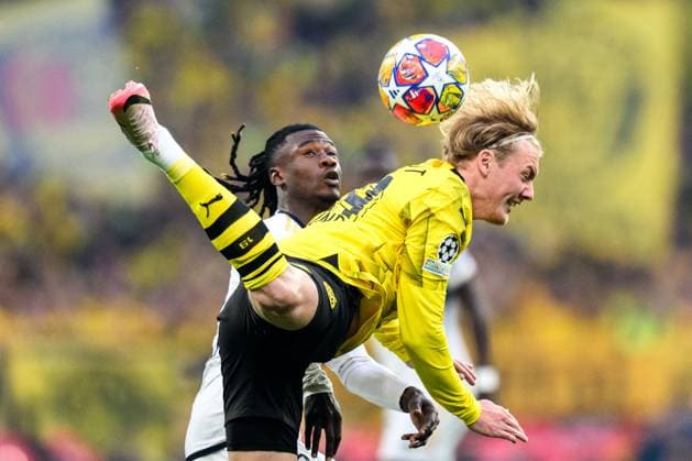 240601 Eduardo Camavinga of Real Madrid and Julian Brandt of Dortmund during the UEFA Champions League final between Dortmund and Real Madrid on June 1, 2024 in London. Photo: Petter Arvidson BILDBYRAN kod PA PA0818 fotboll football soccer fotball champions league final dortmund real madrid bbeng Copyright: PETTERxARVIDSON BB240601PA078