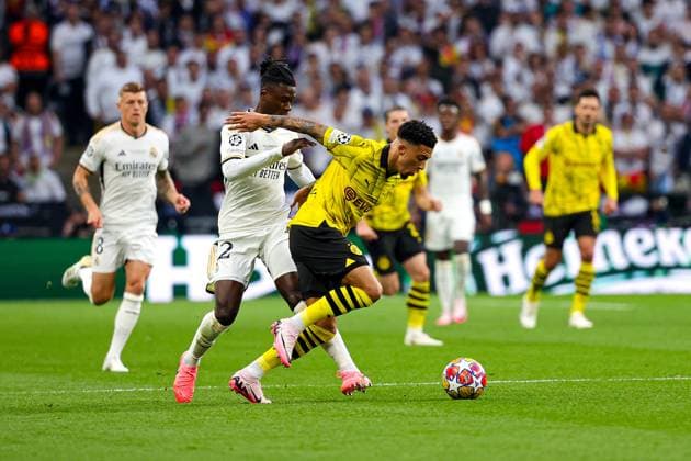 Borussia Dortmund v Real Madrid Champions League 01 06 2024. Final Eduardo Camavinga (12) of Real Madrid brings down Jadon Sancho (10) of Borussia Dortmund during the Champions League Final match between Borussia Dortmund and Real Madrid at Wembley Stadium, London, England on 1 June 2024. Editorial use only , Copyright: xNigelxKeenex PSI-19804-0030