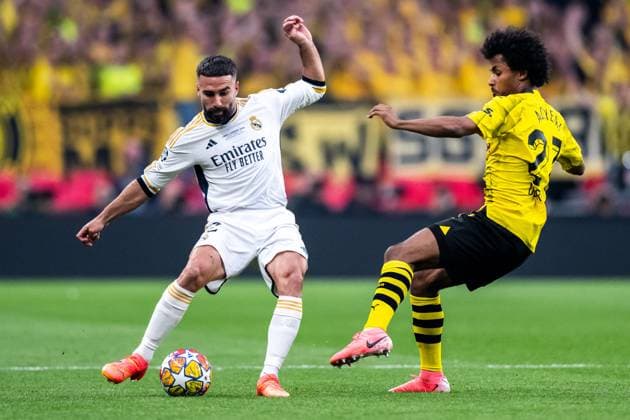 240601 Dani Carvajal of Real Madrid and Karim Adeyemi of Dortmund during the UEFA Champions League final between Dortmund and Real Madrid on June 1, 2024 in London. Photo: Petter Arvidson BILDBYRAN kod PA PA0818 fotboll football soccer fotball champions league final dortmund real madrid bbeng Copyright: PETTERxARVIDSON BB240601PA085