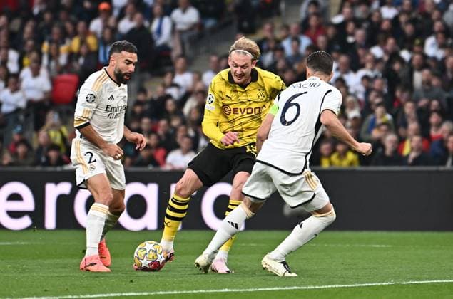 01.06.2024, xfux, Fussball UEFA Champions League Finale 2024, Borussia Dortmund - Real Madrid, emspor, v.l. Daniel Carvajal (Real Madrid), Julian Brandt (Borussia Dortmund), Nacho (Real Madrid) (DFL DFB REGULATIONS PROHIBIT ANY USE OF PHOTOGRAPHS as IMAGE SEQUENCES and or QUASI-VIDEO) London