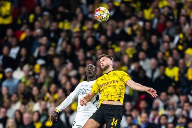 240601 Ferland Mendy of Real Madrid and Niclas Fullkrug of Dortmund during the UEFA Champions League final between Dortmund and Real Madrid on June 1, 2024 in London. Photo: Petter Arvidson BILDBYRAN kod PA PA0818 fotboll football soccer fotball champions league final dortmund real madrid bbeng Copyright: PETTERxARVIDSON BB240601PA112