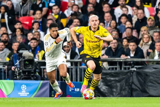 240601 Julian Ryerson of Dortmund and Jude Bellingham of Real Madrid during the UEFA Champions League final between Dortmund and Real Madrid on June 1, 2024 in London. Photo: Petter Arvidson BILDBYRAN kod PA PA0818 fotboll football soccer fotball champions league final dortmund real madrid bbeng Copyright: PETTERxARVIDSON BB240601PA114