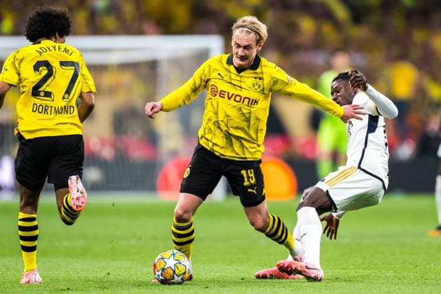 240601 Julian Brandt of Dortmund and Eduardo Camavinga of Real Madrid during the UEFA Champions League final between Dortmund and Real Madrid on June 1, 2024 in London. Photo: Petter Arvidson BILDBYRAN kod PA PA0818 fotboll football soccer fotball champions league final dortmund real madrid bbeng bbauto Copyright: PETTERxARVIDSON BB240601PA149