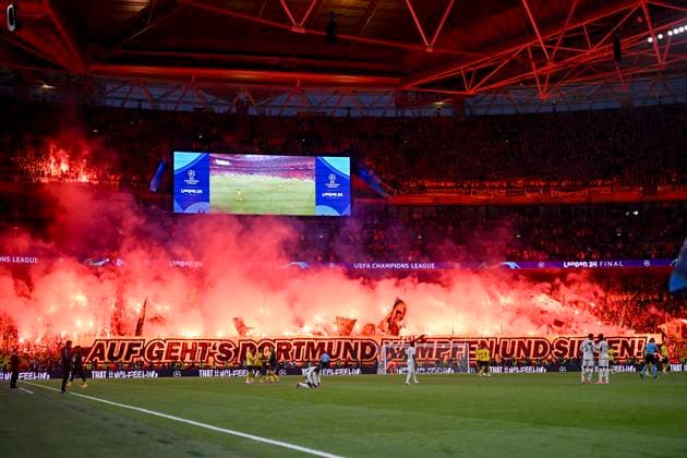 The Borussia Dortmund fans set off pyrotechnics and display a banner before the start of the second half, UEFA Champions League 2023 24 - Final, Borussia Dortmund vs Real Madrid CF, Wembley Stadium, June 1, 2024, London, United Kingdom.