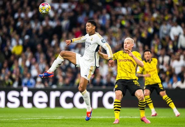 240601 Jude Bellingham of Real Madrid and Julian Ryerson of Dortmund during the UEFA Champions League final between Dortmund and Real Madrid on June 1, 2024 in London. Photo: Petter Arvidson BILDBYRAN kod PA PA0818 fotboll football soccer fotball champions league final dortmund real madrid bbeng bbauto Copyright: PETTERxARVIDSON BB240601PA158