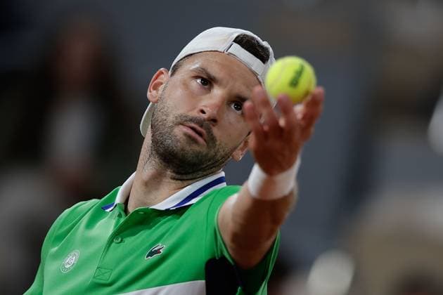 01.06.2024 Tennis, French Open 2024 Roland-Garros, FRA, Men™s Singles Court Philippe-Chatrier - THIRD ROUND Zizou Bergs (BEL) - Grigor Dimitrov (BUL) Bild: v. li. Grigor Dimitrov (BUL) macht einen Aufschlag. Copyright: HMBxMedia AntonioxBorga