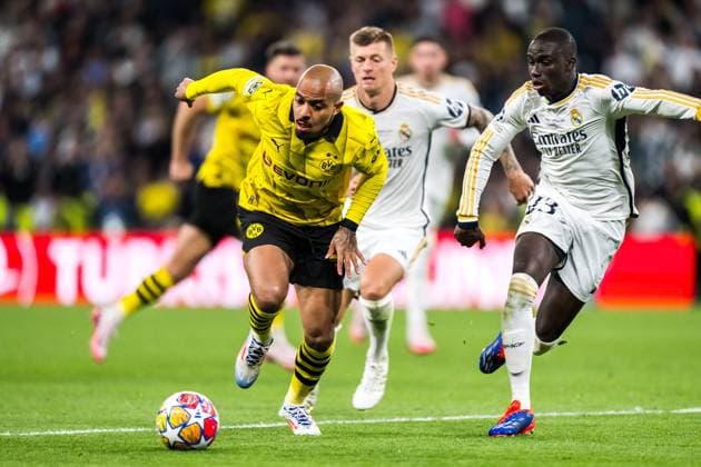 240601 Donyell Malen of Dortmund and Ferland Mendy of Real Madrid during the UEFA Champions League final between Dortmund and Real Madrid on June 1, 2024 in London. Photo: Petter Arvidson BILDBYRAN kod PA PA0818 fotboll football soccer fotball champions league final dortmund real madrid bbeng bbauto Copyright: PETTERxARVIDSON BB240601PA213