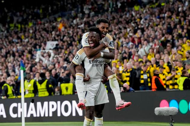 Vinicius Junior (Real Madrid) celebrates after scoring his teams second goal with Rodrygo (Real Madrid), UEFA Champions League 2023 24 - Final, Borussia Dortmund vs Real Madrid CF, Wembley Stadium, June 1, 2024, London, United Kingdom.