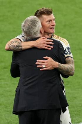 Toni Kroos of Real Madrid hugs Real Madrid manager Carlo Ancelotti in the technical area after they leave the pitch Borussia Dortmund v Real Madrid, UEFA Champions League, Final, Football, Wembley Stadium, London, UK - 01 June 2024 EDITORIAL USE ONLY No use with unauthorised audio, video, data, fixture lists, club league logos or live services. Online in-match use limited to 120 images, no video emulation. No use in betting, games or single club league player publications. Copyright: xPaulxCurrie Shutterstockx 14516316ep