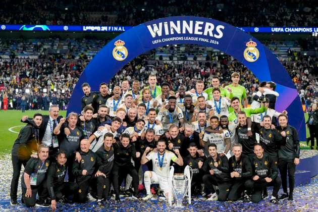 The Real Madrid players and coach Carlo Ancelotti (Real Madrid) celebrate winning the Champions League, UEFA Champions League 2023 24 - Final, Borussia Dortmund vs Real Madrid CF, Wembley Stadium, June 1, 2024, London, United Kingdom.