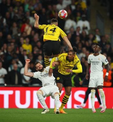 Borussia Dortmund v Real Madrid, London, UK - 1 Jun 2024 Dani Ceballos of Real Madrid battles with Niclas Fullkrug and Sebastien Haller of Borussia Dortmund during the UEFA Champions League Final match between Borussia Dortmund and Real Madrid at Wembley Stadium, London on 1 June 2024 ( London Wembley Stadium London England Copyright: xMicahxCrook PPAUKx PPA-120003