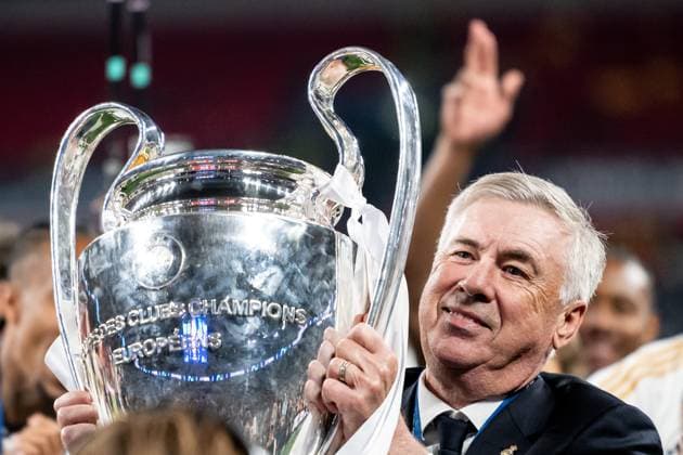 240601 Head coach Carlo Ancelotti of Real Madrid celebrates with the trophy after the UEFA Champions League final between Dortmund and Real Madrid on June 1, 2024 in London. Photo: Petter Arvidson BILDBYRAN kod PA PA0818 fotboll football soccer fotball champions league final dortmund real madrid bbeng jubel Copyright: PETTERxARVIDSON BB240601PA335