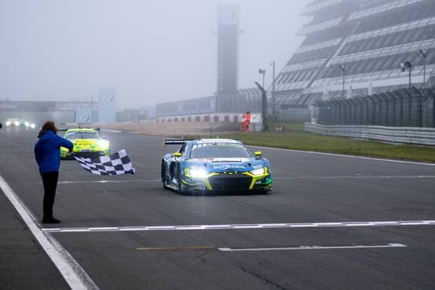 Sport Themen der Woche KW22 Sport Bilder des Tages Frank Stippler, Christopher Mies, Ricardo Feller, Dennis Marschall (Scherer PHX Phoenix, Audi R8 LMS GT3 evo II, SP9, 16) werden beim Rennabbruch mit der schwarz weiß karierten Zielflagge als Sieger abgewunken, GER, 52. ADAC Ravenol 24h Nuerburgring, 24 Stunden Rennen, 02.06.2024 GER, 52. ADAC Ravenol 24h Nuerburgring, 24 Stunden Rennen, 02.06.2024 Nuerburg *** Frank Stippler, Christopher Mies, Ricardo Feller, Dennis Marschall Scherer Sport PHX Phoenix, Audi R8 LMS GT3 evo II, SP9, 16 are waved off as winners when the race is stopped with the black and white checkered flag, GER, 52 ADAC Ravenol 24h Nuerburgring, 24 hours race, 02 06 2024 GER, 52 ADAC Ravenol 24h Nuerburgring, 24 hours race, 02 06 2024 Nuerburg Copyright: xEibner-Pressefoto Memmlerx EP_MMR