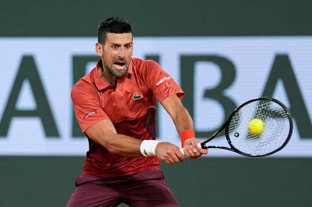 PARIS, FRANCE - JUNE 2: Novak Djokovic of Serbia plays a strong backhand shot during the round of 8 of match between Novak Djokovic vs Lorenzo Musetti at Roland Garros Stadium on June 2, 2024 in Paris, France. (Photo by Glenn Gervot Icon Sportswire) TENNIS: JUN 01 Roland-Garros EDITORIAL USE ONLY Icon20240602252762024