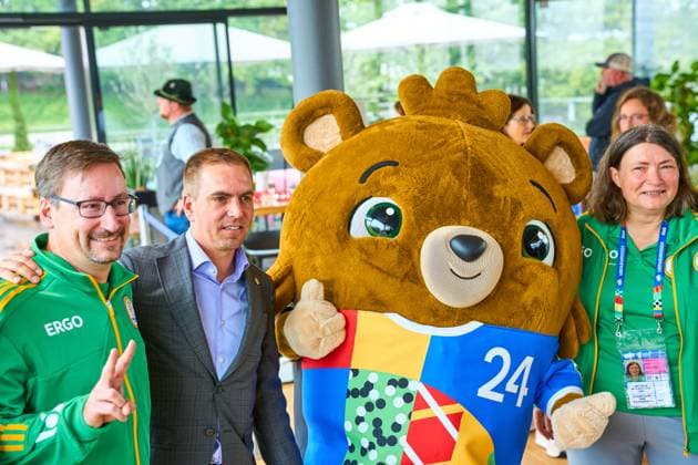 Munich, Bavaria, Germany - June 3, 2024: Philipp Lahm EM Ambassador in the Olympic Park in Munich with mascot Albärt and helpers of UEFA EURO, EM, Europameisterschaft,Fussball 2024
