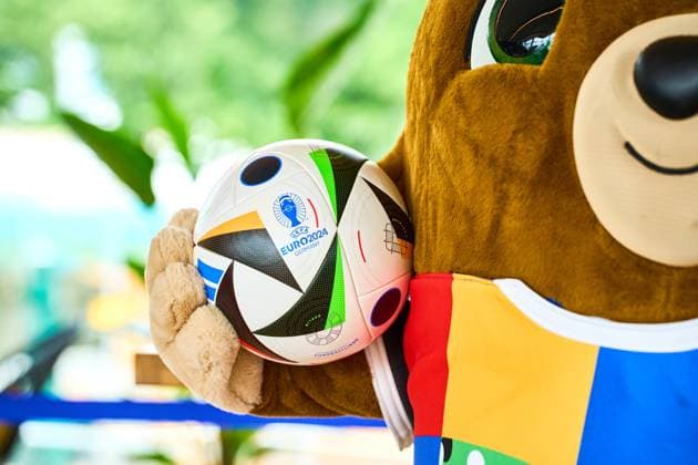 Munich, Bavaria, Germany - June 3, 2024: The official mascot of UEFA EURO, EM, Europameisterschaft,Fussball 2024 Albärt poses with the football love ball at a press event in the Olympic Park in Munich