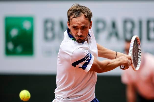 Daniil Medvedev plays a backhand against Alex de Minaur of Australia during the Men™s Singles Round of 16 of 2024 French Open - Day 9 at Roland Garros on June 3, 2024 in Paris, France. (Photo by JustPictures) Paris Roland Garros France