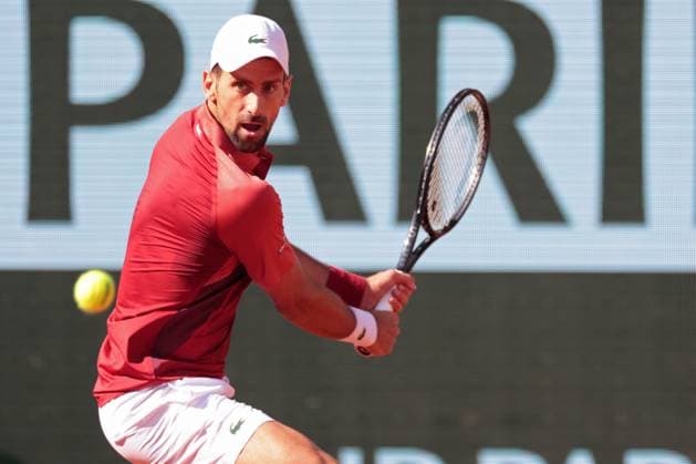 3rd June 2024; Roland Garros, Paris, France; 2024 French Open Tennis tournament, Day 9; Novak Djokovic in bright sunshine playing Francisco Cerundolo during his match versus Francisco Cerundolo (arg)  ActionPlus12650680 JonxBromley