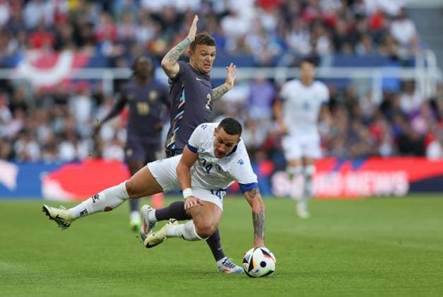 Newcastle Upon Tyne, England, 3rd June 2024. Kieran Trippier (L) of England in action with Dario Saric of Bosnia-Herzegovina during the International Friendly, Länderspiel, Nationalmannschaft match between England and Bosnia-Herzegovina at St. James Park, Newcastle Upon Tyne. Picture credit should read: Nigel Roddis Sportimage EDITORIAL USE ONLY. No use with unauthorised audio, video, data, fixture lists, club league logos or live services. Online in-match use limited to 120 images, no video emulation. No use in betting, games or single club league player publications. SPI-3178-0008