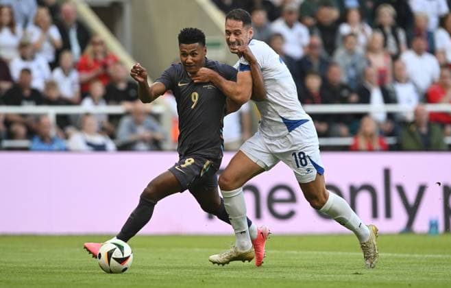 Ollie Watkins of England is challenged by Nikola Katic of Bosnia and Herzegovina England v Bosnia and Herzegovina, International Friendly, Länderspiel, Nationalmannschaft Football, St James Park, Newcastle, UK, 03 June 2024 EDITORIAL USE ONLY No use with unauthorised audio, video, data, fixture lists, club league logos or live services. Online in-match use limited to 120 images, no video emulation. No use in betting, games or single club league player publications.  Copyright: xGreigxCowie Shutterstockx 14520843br