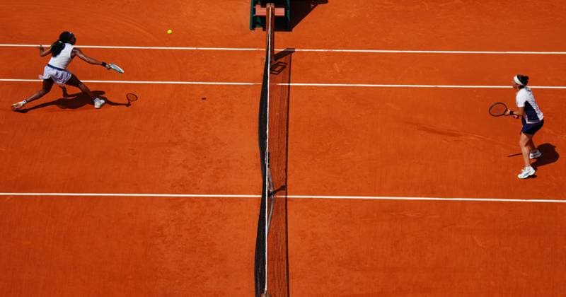 Coco Gauff and Ons Jabeur in action at the net during their quarter final clash French Open Tennis, Day 10, Tennis, Roland Garros, Paris, France - 04 June 2024  Copyright: xJavierxGarcia Shutterstockx 14521933i
