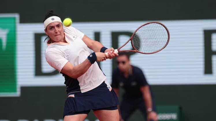4th June 2024; Roland Garros, Paris, France; 2024 French Open Tennis tournament, Day 10; Ons Jabeur (TUN) plays a backhand during her match with Coco Gauff (USA)  ActionPlus12650725 JonxBromley