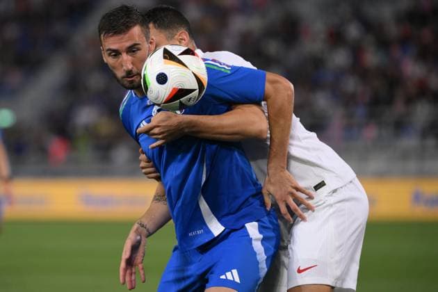Bryan Cristante of Italy and Kaan Ayhan of Turkey during a friendly football match between Italy and Turkey at Renato Dall Ara stadium in Bologna (Italy), June 4th, 2024. andreaxstaccioli