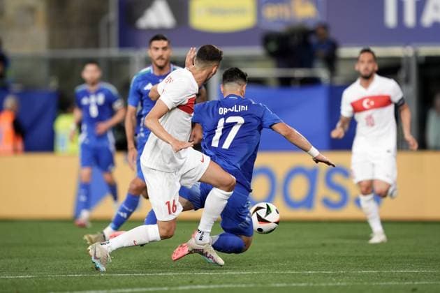 Italy s Riccardo Orsolini fights for the ball with Turkiye s Mert Muldur during the Friendly Matches 2024 between Italy and Turkiye at Renato Dall& x2019;Ara Stadium - Soccer - Bologna, Italy - Tuesday June 4, 2024  Copyright: xMassimoxPaolone LaPressex
