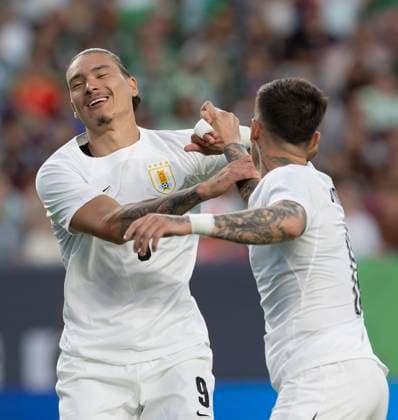 June 5, 2024, Denver, Colorado, USA: Uruguay F DARWIN NUNEZ, 9, celebrates. with a team mate after scoring 3 goals for his team at Empower Field at Mile High Wed. evening.The Uruguay national team, Nationalteam beats the Mexican National team 4-0. Denver USA - ZUMAav4_ 20240605_zaf_av4_001 Copyright: xHectorxAcevedox