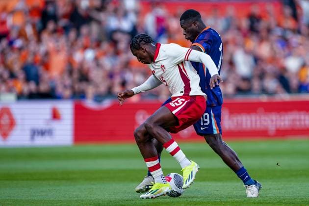 2024-06-06 Netherlands v Canada - Friendly International ROTTERDAM, NETHERLANDS - JUNE 6: Moise Bombito of Canada battles for the ball with Brian Brobbey of Netherlands during the Friendly international match, Länderspiel, Nationalmannschaft between Netherlands and Canada at Stadion Feijenoord de Kuip on June 6, 2024 in Rotterdam, Netherlands. (Photo by Andre Weening BSR Agency) Rotterdam Netherlands Content not available for redistribution in The Netherlands directly or indirectly through any third parties. Copyright: xBSRxAgencyx