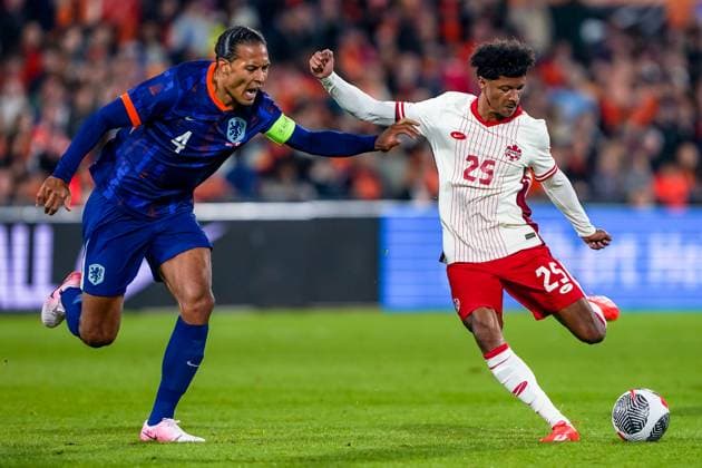 2024-06-06 Netherlands v Canada - Friendly International ROTTERDAM, NETHERLANDS - JUNE 6: Charles Brym of Canada is challenged by Virgil van Dijk of Netherlands during the Friendly international match, Länderspiel, Nationalmannschaft between Netherlands and Canada at Stadion Feijenoord de Kuip on June 6, 2024 in Rotterdam, Netherlands. (Photo by Andre Weening BSR Agency) Rotterdam Netherlands Content not available for redistribution in The Netherlands directly or indirectly through any third parties. Copyright: xBSRxAgencyx