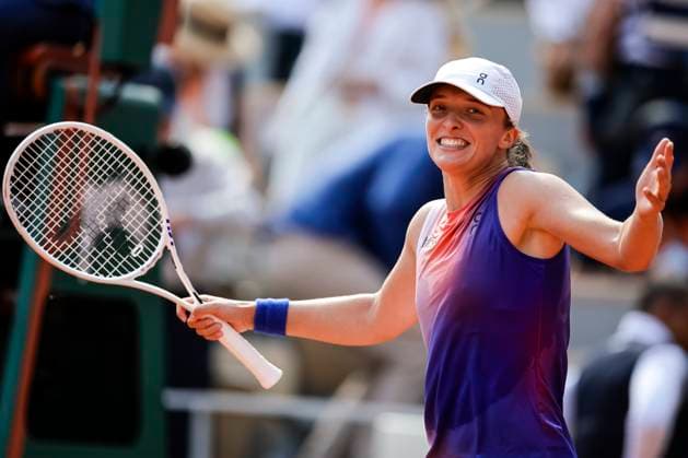 Iga Swiatek of Poland celebrates after winning her match against Coco Gauff of United States during the Women™s Single Semi Finals of 2024 French Open - Day 12 at Roland Garros on June 6, 2024 in Paris, France. (Photo by JustPictures) Paris Roland Garros France