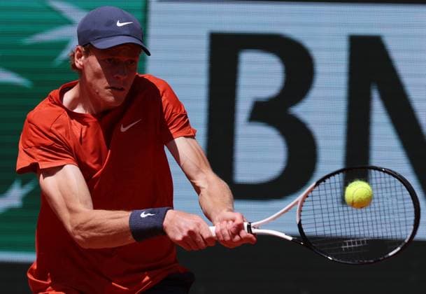(240607) -- PARIS, June 7, 2024 -- Jannik Sinner hits a return during the men s singles semifinal between Carlos Alcaraz of Spain and Jannik Sinner of Italy at the French tennis tournament at Roland Garros in Paris, France, June 7, 2024. ) (SP)FRANCE-PARIS-TENNIS-FRENCH OPEN-MEN S SINGLES GaoxJing 