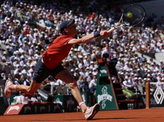 (240607) -- PARIS, June 7, 2024 -- Jannik Sinner hits a return during the men s singles semifinal between Carlos Alcaraz of Spain and Jannik Sinner of Italy at the French tennis tournament at Roland Garros in Paris, France, June 7, 2024. ) (SP)FRANCE-PARIS-TENNIS-FRENCH OPEN-MEN S SINGLES GaoxJing 