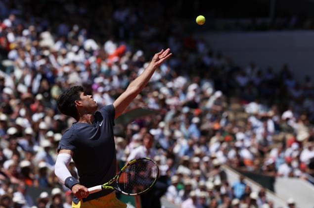 (240607) -- PARIS, June 7, 2024 -- Carlos Alcaraz serves during the men s singles semifinal between Carlos Alcaraz of Spain and Jannik Sinner of Italy at the French tennis tournament at Roland Garros in Paris, France, June 7, 2024. ) (SP)FRANCE-PARIS-TENNIS-FRENCH OPEN-MEN S SINGLES GaoxJing 