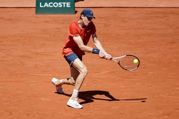 Jannik Sinner of Italy plays a backhand against Carlos Alcaraz of Spain during the Men™s Singles Semi Finals of 2024 French Open - Day 13 at Roland Garros on June 7, 2024 in Paris, France. (Photo by JustPictures) Paris Roland Garros France
