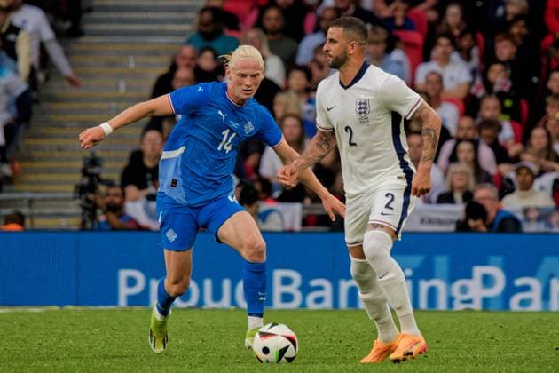 London, England, June 07 2024: Kyle Walker (2 England) and Kolbeinn Finnsson (14 Iceland) in action during the International Friendly, Länderspiel, Nationalmannschaft game between England and Iceland at Wembley Stadium in London, England. (Pedro Porru SPP) Copyright: xPedroxPorrux xSPPx spp-en-PePoSp-4F8A9767