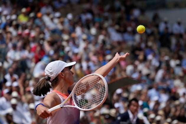 (240608) -- PARIS, June 8, 2024 -- Iga Swiatek serves during the women s singles final match between Iga Swiatek of Poland and Jasmine Paolini of Italy at the French Open tennis tournament at Roland Garros, Paris, France, June 8, 2024. ) (SP)FRANCE-PARIS-TENNIS-FRENCH OPEN-WOMEN S SINGLES GaoxJing 