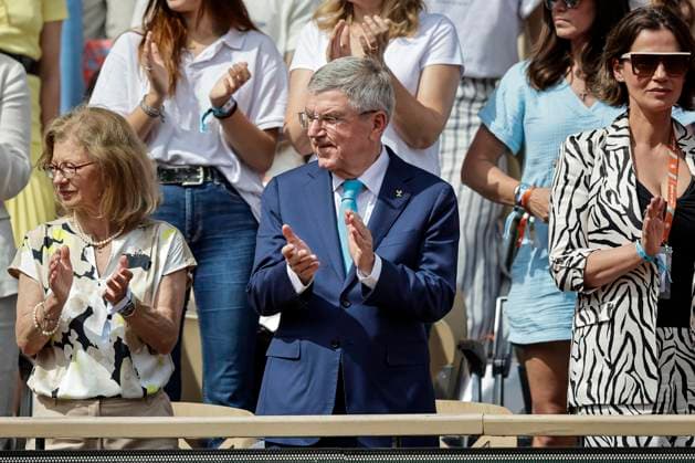 International Olympic Committee president Thomas Bach Oly (C) watches Iga Swiatek of Poland in action against Jasmine Paolini of Italy during the Women™s Singles Finals of 2024 French Open - Day 14 at Roland Garros on June 8, 2024 in Paris, France. (Photo by JustPictures) Paris Roland Garros France
