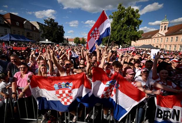 Sport Themen der Woche KW23 Sport Bilder des Tages Croatia Squad UEFA EURO, EM, Europameisterschaft,Fussball 2024 Neuruppin Welcome party Croatia fans cheer during Croatia national team, Nationalteam UEFA EURO 2024 Welcome party at Neuruppin s school square in Neuruppin, Germany on June 9, 2024. The Croatian Football Federation has chosen the Neuruppin base camp for the Croatia national team during EURO 2024. MarkoxLukunic PIXSELL